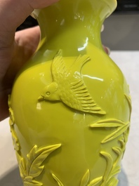 A pair of Chinese yellow Peking glass vases with peonies and a bird, 20th C.