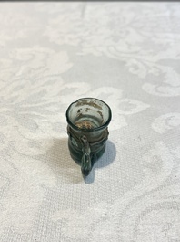 A Dutch or German green glass reliquary holder, excavated in Maastricht, 16/17th C.