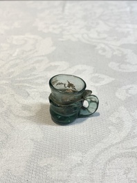A Dutch or German green glass reliquary holder, excavated in Maastricht, 16/17th C.