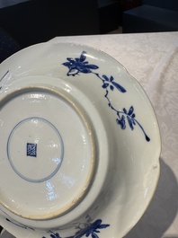 A Chinese blue and white lobed 'flower' plate and a 'phoenix and monkeys' plate, Kangxi