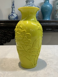 A pair of Chinese yellow Peking glass vases with peonies and a bird, 20th C.