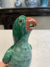A pair of Chinese sancai-glazed parrots, 19th C.