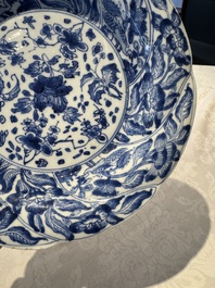 A Chinese blue and white lobed 'flower' plate and a 'phoenix and monkeys' plate, Kangxi