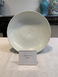 A Chinese white-glazed incised 'double phoenix' dish, Jiajing mark and of the period