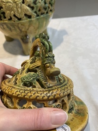 A Chinese sancai-glazed reticulated double-walled tripod censer and cover, Ming