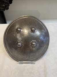 An Indo-Persian parcel-gilt and silver inlaid shield or dhal, 18/19th C.