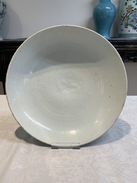 A Chinese white-glazed incised 'double phoenix' dish, Jiajing mark and of the period