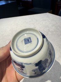 Two Chinese blue and white cups and saucers, Kangxi/Yongzheng