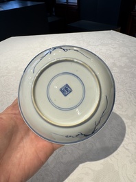 Two Chinese blue and white cups and saucers, Kangxi/Yongzheng