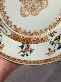 A pair of Chinese armorial monogrammed plates and a famille rose plate, Kangxi/Yongzheng
