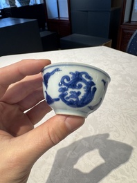 Two Chinese blue and white cups and saucers, Kangxi/Yongzheng