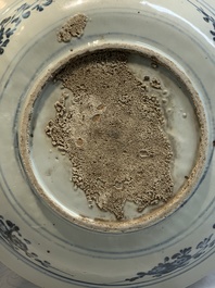 A Chinese Swatow blue and white 'lady and a boy' dish, Ming