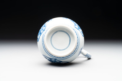 A Chinese blue and white jug with floral design, Kangxi