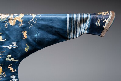 A Chinese gold-thread-embroidered blue-ground silk 'dragon' robe, 18/19th C.