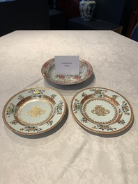 A pair of Chinese armorial monogrammed plates and a famille rose plate, Kangxi/Yongzheng