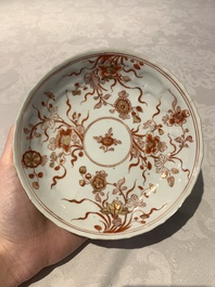 A Chinese gilt iron-red saucer and a blue and white saucer, Johanneum marks, ex-collection of August the Strong, Kangxi