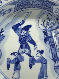 A pair of Chinese blue and white 'dragon' plates and a plate with narrative design, Yuzhen mark, Kangxi/Yongzheng