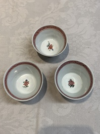 Ten Chinese famille rose cups with floral design and eight saucers, Qianlong