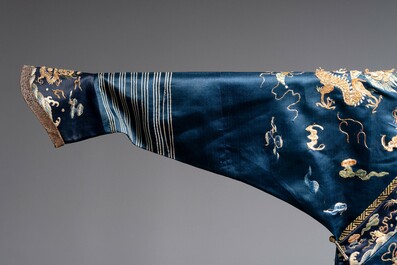 A Chinese gold-thread-embroidered blue-ground silk 'dragon' robe, 18/19th C.