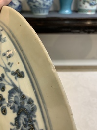 A Chinese Swatow blue and white 'lady and a boy' dish, Ming