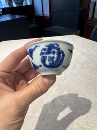 Two Chinese blue and white cups and saucers, Kangxi/Yongzheng
