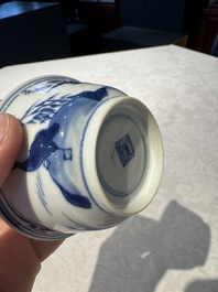Two Chinese blue and white cups and saucers, Kangxi/Yongzheng