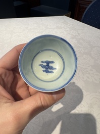 Two Chinese blue and white cups and saucers, Kangxi/Yongzheng