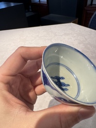 Two Chinese blue and white cups and saucers, Kangxi/Yongzheng