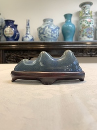 A Chinese blue-glazed Yixing stoneware 'lotus' bowl, and a brush rest on wooden stand, 18/19th C.