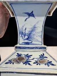 A Chinese blue, white and copper-red square-sectioned vase with figural design, Kangxi