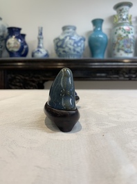 A Chinese blue-glazed Yixing stoneware 'lotus' bowl, and a brush rest on wooden stand, 18/19th C.