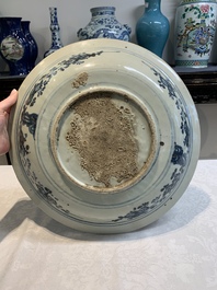 A Chinese Swatow blue and white 'lady and a boy' dish, Ming