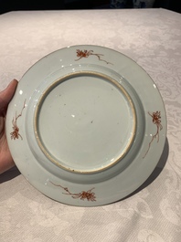 A pair of Chinese armorial monogrammed plates and a famille rose plate, Kangxi/Yongzheng