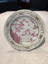 A Chinese puce-enamelled and gilt-decorated 'harbour scene' plate, Qianlong