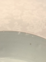 A Chinese puce-enamelled and gilt-decorated 'harbour scene' plate, Qianlong