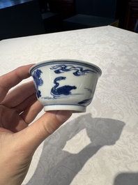 Two Chinese blue and white cups and saucers, Kangxi/Yongzheng