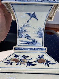 A Chinese blue, white and copper-red square-sectioned vase with figural design, Kangxi
