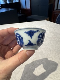 Two Chinese blue and white cups and saucers, Kangxi/Yongzheng