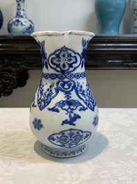 A Chinese blue and white jug with floral design, Kangxi
