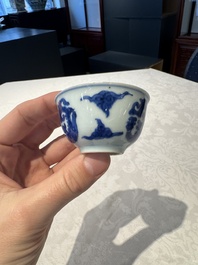 Two Chinese blue and white cups and saucers, Kangxi/Yongzheng