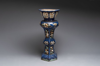 A Chinese or Vietnamese polychrome-glaze pottery jardini&egrave;re and stand, 19th C.