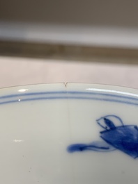A pair of Chinese blue and white 'dragon' plates and a plate with narrative design, Yuzhen mark, Kangxi/Yongzheng
