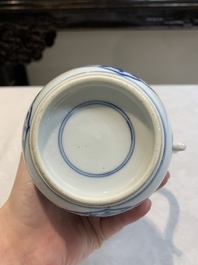 A Chinese blue and white jug with floral design, Kangxi