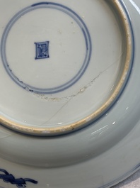 A pair of Chinese blue and white 'dragon' plates and a plate with narrative design, Yuzhen mark, Kangxi/Yongzheng