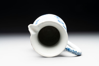 A Chinese blue and white jug with floral design, Kangxi