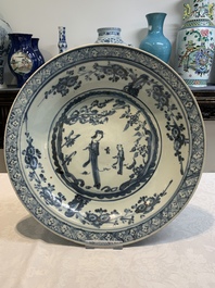 A Chinese Swatow blue and white 'lady and a boy' dish, Ming