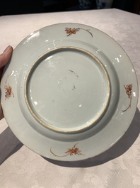 A pair of Chinese armorial monogrammed plates and a famille rose plate, Kangxi/Yongzheng