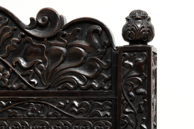 A Dutch colonial carved and ebonized wooden bench, 18th C.