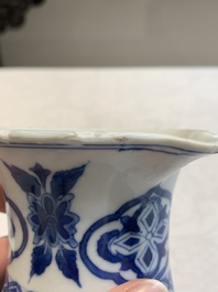 A Chinese blue and white jug with floral design, Kangxi