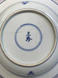 A pair of Chinese blue and white 'dragon' plates and a plate with narrative design, Yuzhen mark, Kangxi/Yongzheng